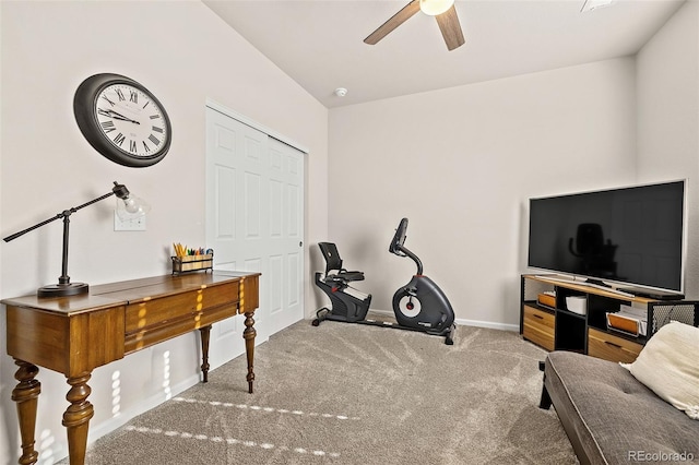 interior space with ceiling fan