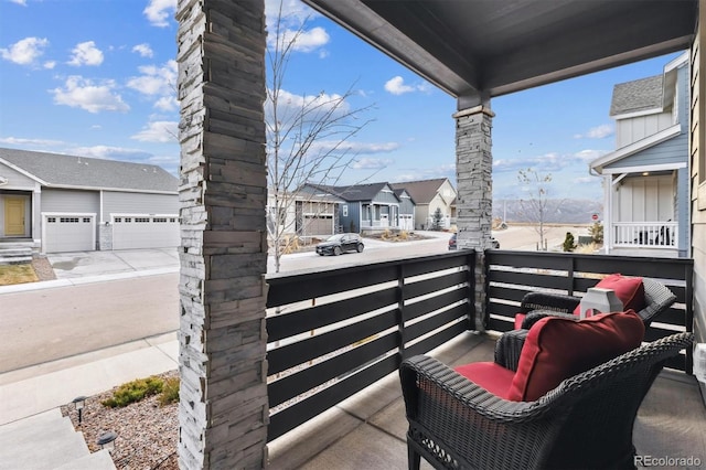 balcony featuring a residential view