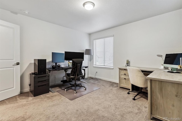 home office with carpet and baseboards