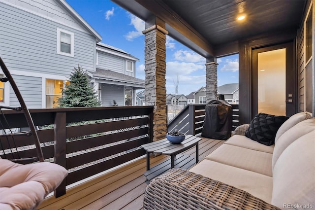 balcony featuring a residential view and outdoor lounge area