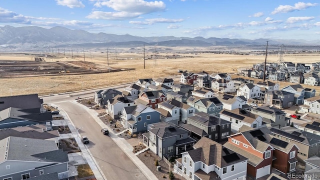 aerial view with a residential view and a mountain view