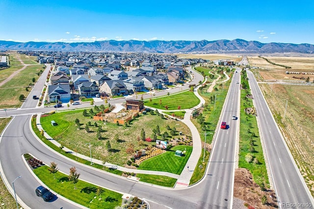 birds eye view of property with a residential view and a mountain view