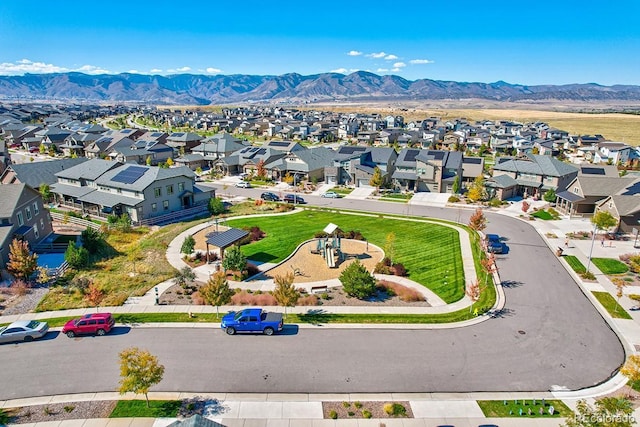 aerial view with a mountain view and a residential view