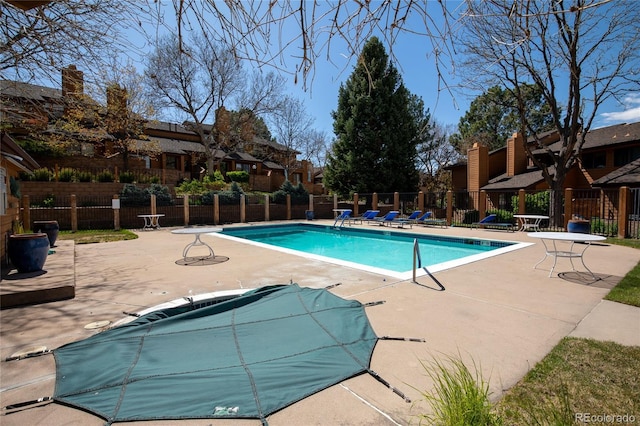 9400 E Iliff Ave Unit 411, Denver, CO 80231 - community pool featuring a patio area and fence