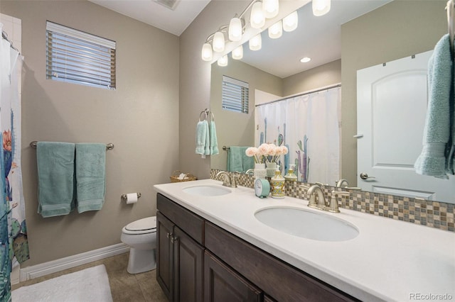 24028 E Caleb Pl, Aurora, CO 80016 - full bath with double vanity, tile patterned floors, and a shower with curtain