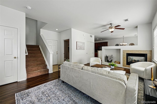 13020 Grant Cir W Unit A, Thornton, CO 80241 - living room with wood finished floors, ceiling fan, stairway, recessed lighting, and a chandelier