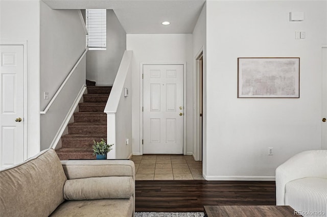13020 Grant Cir W Unit A, Thornton, CO 80241 - living room featuring wood finished floors, stairway, baseboards, and recessed lighting