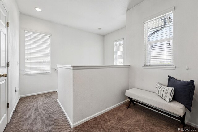 13020 Grant Cir W Unit A, Thornton, CO 80241 - living area with carpet, an upstairs landing, baseboards, and recessed lighting