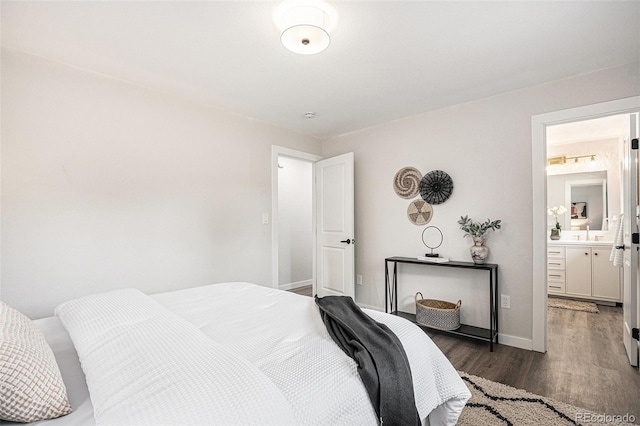 530 Everett St, Lakewood, CO 80226 - bedroom featuring wood finished floors and ensuite bathroom