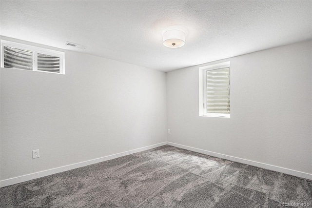 530 Everett St, Lakewood, CO 80226 - spare room featuring carpet flooring and a textured ceiling