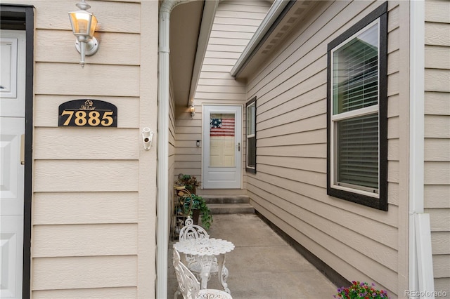 7885 Buckhorn Grn Unit 131, Frederick, CO 80530 - view of exterior entry with a surveillance system