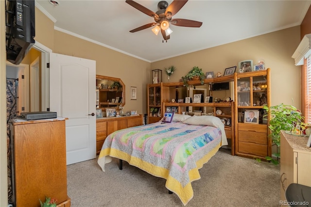 7885 Buckhorn Grn Unit 131, Frederick, CO 80530 - bedroom featuring carpet flooring, ornamental molding, and a ceiling fan