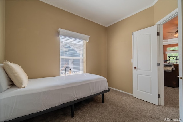 7885 Buckhorn Grn Unit 131, Frederick, CO 80530 - bedroom featuring carpet and crown molding