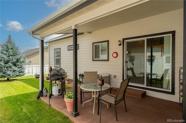 7885 Buckhorn Grn Unit 131, Frederick, CO 80530 - view of patio / terrace featuring a grill and outdoor dining area
