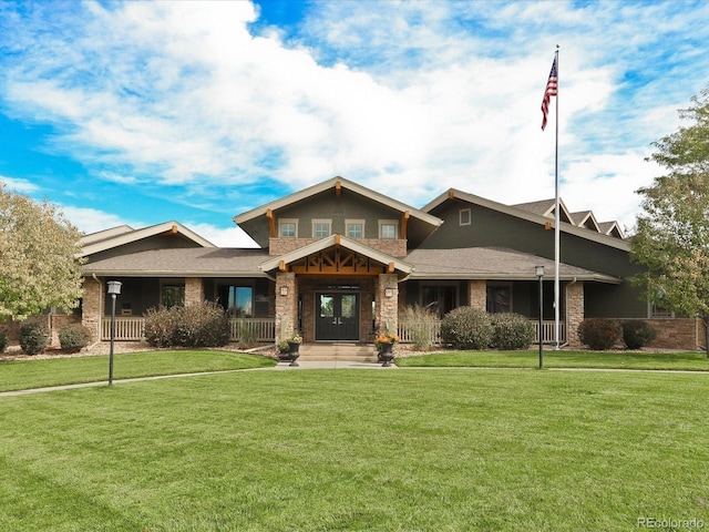 7885 Buckhorn Grn Unit 131, Frederick, CO 80530 - craftsman house with a front lawn and stone siding