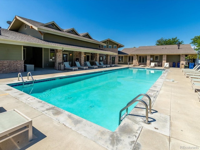 7885 Buckhorn Grn Unit 131, Frederick, CO 80530 - community pool with a patio