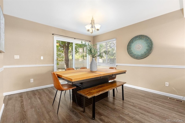2640 Overlook Dr, Broomfield, CO 80020 - dining room with a chandelier and wood finished floors