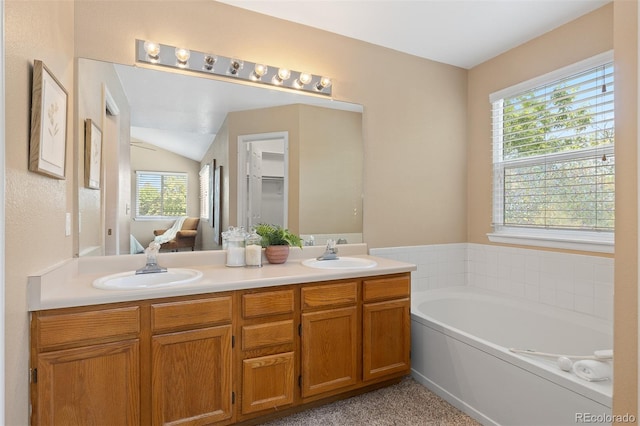 2640 Overlook Dr, Broomfield, CO 80020 - bathroom featuring double vanity and a bath
