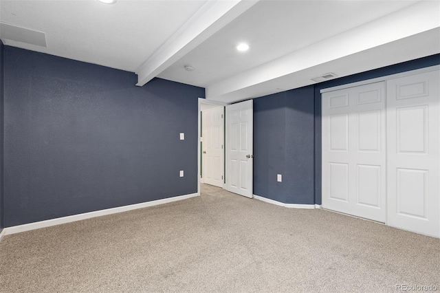 2640 Overlook Dr, Broomfield, CO 80020 - unfurnished bedroom featuring beamed ceiling, carpet flooring, and a closet