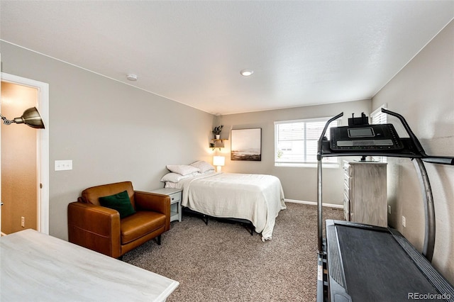 bedroom featuring dark carpet