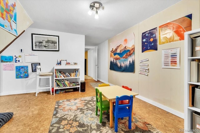 playroom featuring baseboards