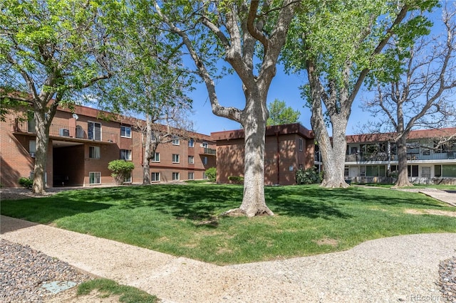 10185 W 25th Ave Unit 33, Lakewood, CO 80215 - surrounding community featuring a lawn