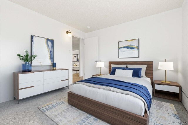 10185 W 25th Ave Unit 33, Lakewood, CO 80215 - bedroom featuring light colored carpet