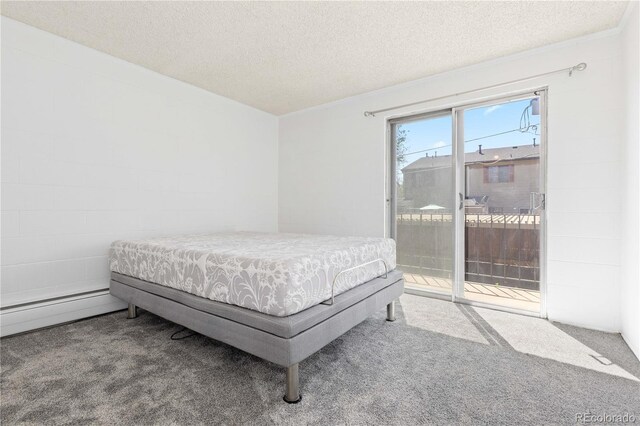 10185 W 25th Ave Unit 33, Lakewood, CO 80215 - bedroom featuring access to exterior, carpet floors, and a textured ceiling