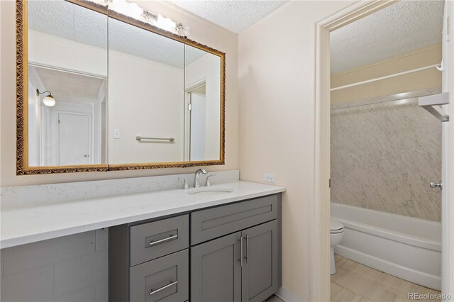 10185 W 25th Ave Unit 33, Lakewood, CO 80215 - full bathroom with a textured ceiling, toilet, vanity, and bathtub / shower combination