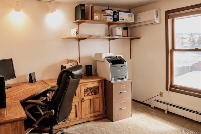 office space with a wall unit AC, a baseboard radiator, and light colored carpet