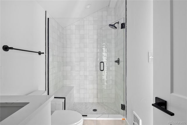 full bathroom with a stall shower, visible vents, and toilet