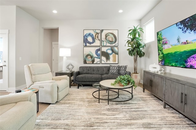 21209 E 62nd Ave, Aurora, CO 80019 - living room featuring light wood-style floors and recessed lighting