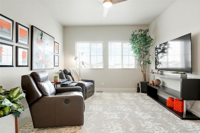 21209 E 62nd Ave, Aurora, CO 80019 - living area with carpet and ceiling fan