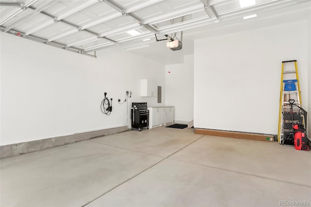 21209 E 62nd Ave, Aurora, CO 80019 - garage featuring electric panel and a garage door opener