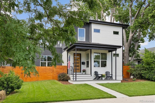 2111 S Franklin St, Denver, CO 80210 - view of front facade with a porch