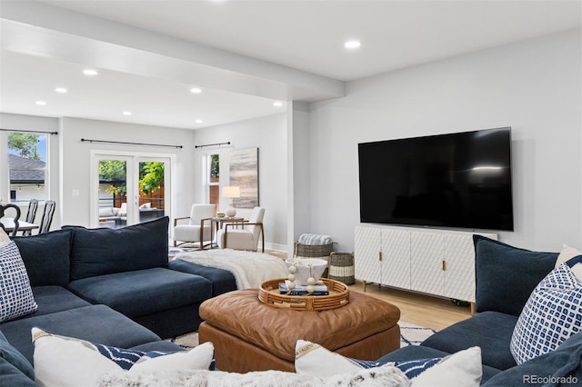 2111 S Franklin St, Denver, CO 80210 - living area with wood finished floors, recessed lighting, and french doors