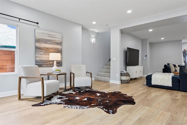 2111 S Franklin St, Denver, CO 80210 - living area featuring wood finished floors, stairway, and recessed lighting