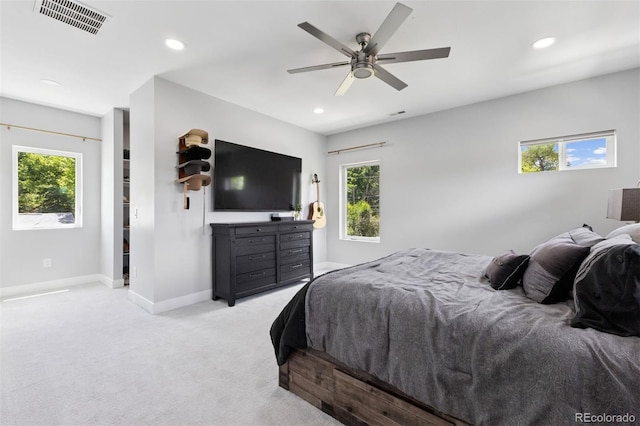 2111 S Franklin St, Denver, CO 80210 - bedroom featuring light carpet, multiple windows, recessed lighting, and a ceiling fan