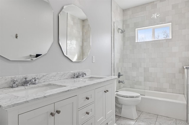 2111 S Franklin St, Denver, CO 80210 - bathroom featuring double vanity, bathtub / shower combination, and marble finish flooring