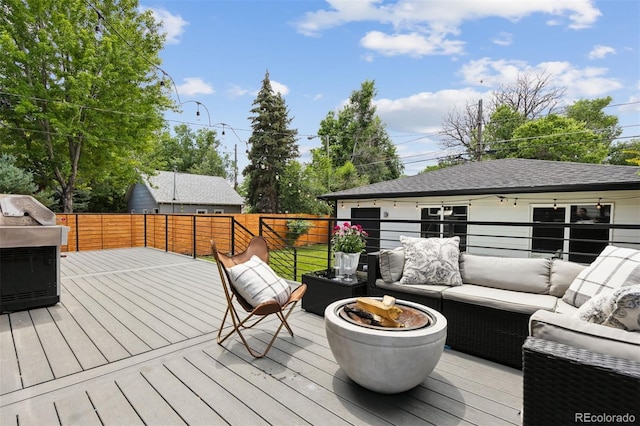 2111 S Franklin St, Denver, CO 80210 - wooden terrace with outdoor lounge area, a grill, and a fenced backyard