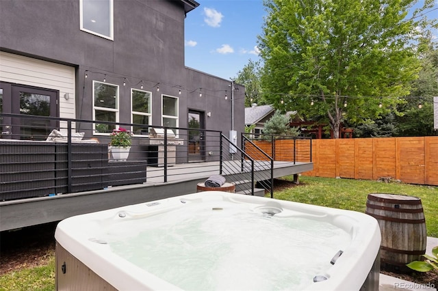 2111 S Franklin St, Denver, CO 80210 - view of patio / terrace with a hot tub and a deck