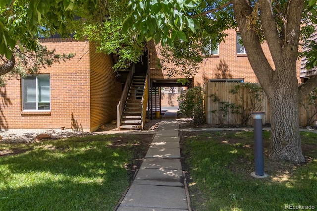 745 Thomas Dr Unit 2, Boulder, CO 80303 - view of front facade featuring brick siding and stairway