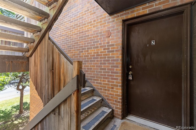 745 Thomas Dr Unit 2, Boulder, CO 80303 - doorway to property featuring brick siding