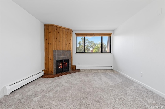 745 Thomas Dr Unit 2, Boulder, CO 80303 - unfurnished living room featuring baseboard heating, a tile fireplace, and carpet floors