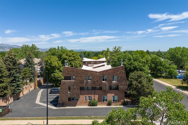 745 Thomas Dr Unit 2, Boulder, CO 80303 - view of building exterior featuring a mountain view and uncovered parking