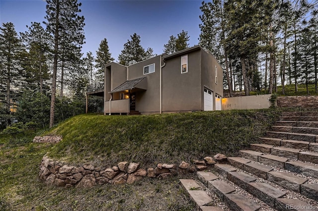 exterior space with a garage