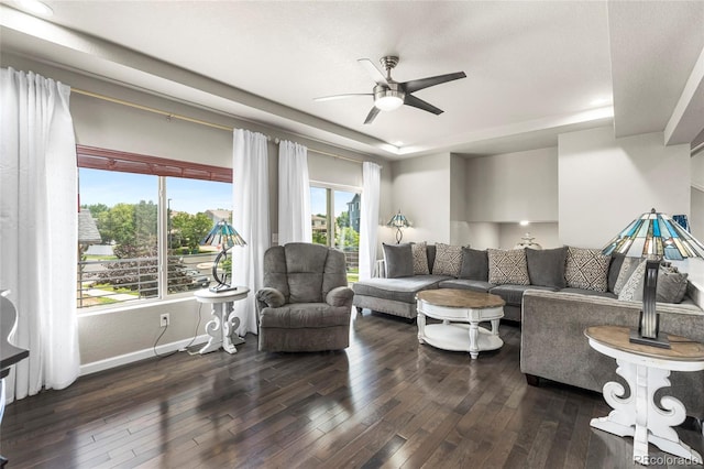 18651 E 53rd Ave, Denver, CO 80249 - living room with a ceiling fan, hardwood / wood-style flooring, and baseboards