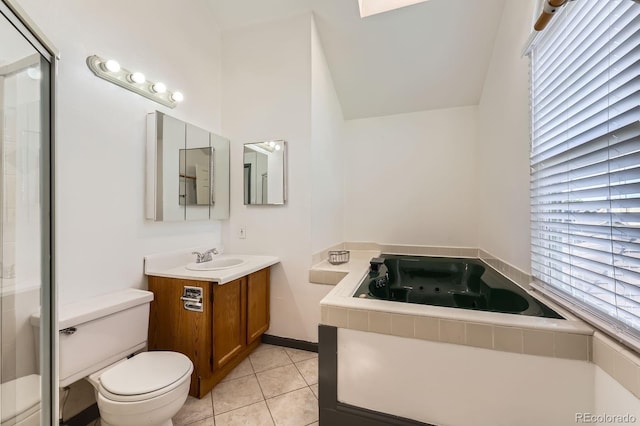 3320 Simmelink Loop, Colorado Springs, CO 80916 - bathroom with vanity, toilet, tile patterned floors, a tub with jets, and an enclosed shower
