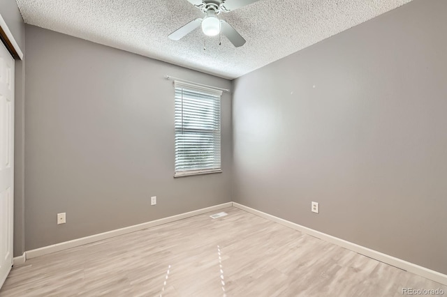 3320 Simmelink Loop, Colorado Springs, CO 80916 - empty room featuring a textured ceiling, wood finished floors, ceiling fan, and baseboards