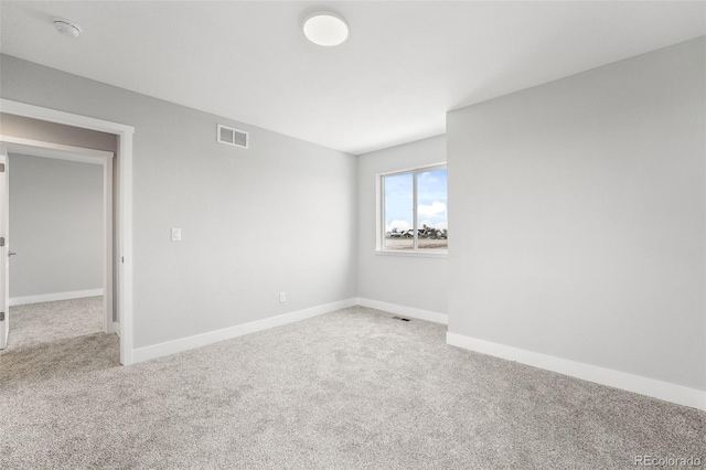 view of carpeted spare room